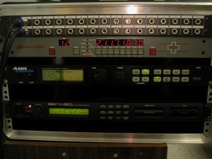 The drum rack unit, which provides a home for the DM5 and the RM-50 computers, plus a MIDI router that is connected to the recording computer plus a few other keyboards and samplers that happen to live in the same area.
